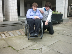 Aaron McIntosh & Dame Anne Begg MP near the Town House highlighting the issue