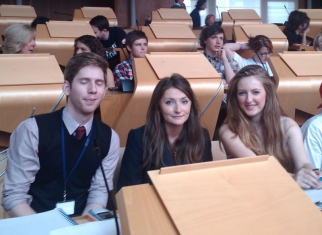 Kris, Megan and Ashleigh in the Scottish Parliament.