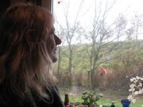 Susan Munro Looking Out Of Her Kitchen At A Bund Photo - March 2013