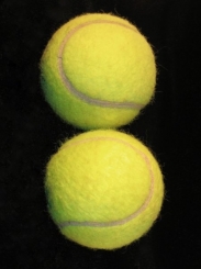 TENNIS BALLS ON BLACK